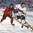 BUFFALO, NEW YORK - JANUARY 2: Switzerland's Justin Sigrist #13 plays the puck while Canada's Johah Gadjovich #11 defends during quarterfinal round action at the 2018 IIHF World Junior Championship. (Photo by Matt Zambonin/HHOF-IIHF Images)

